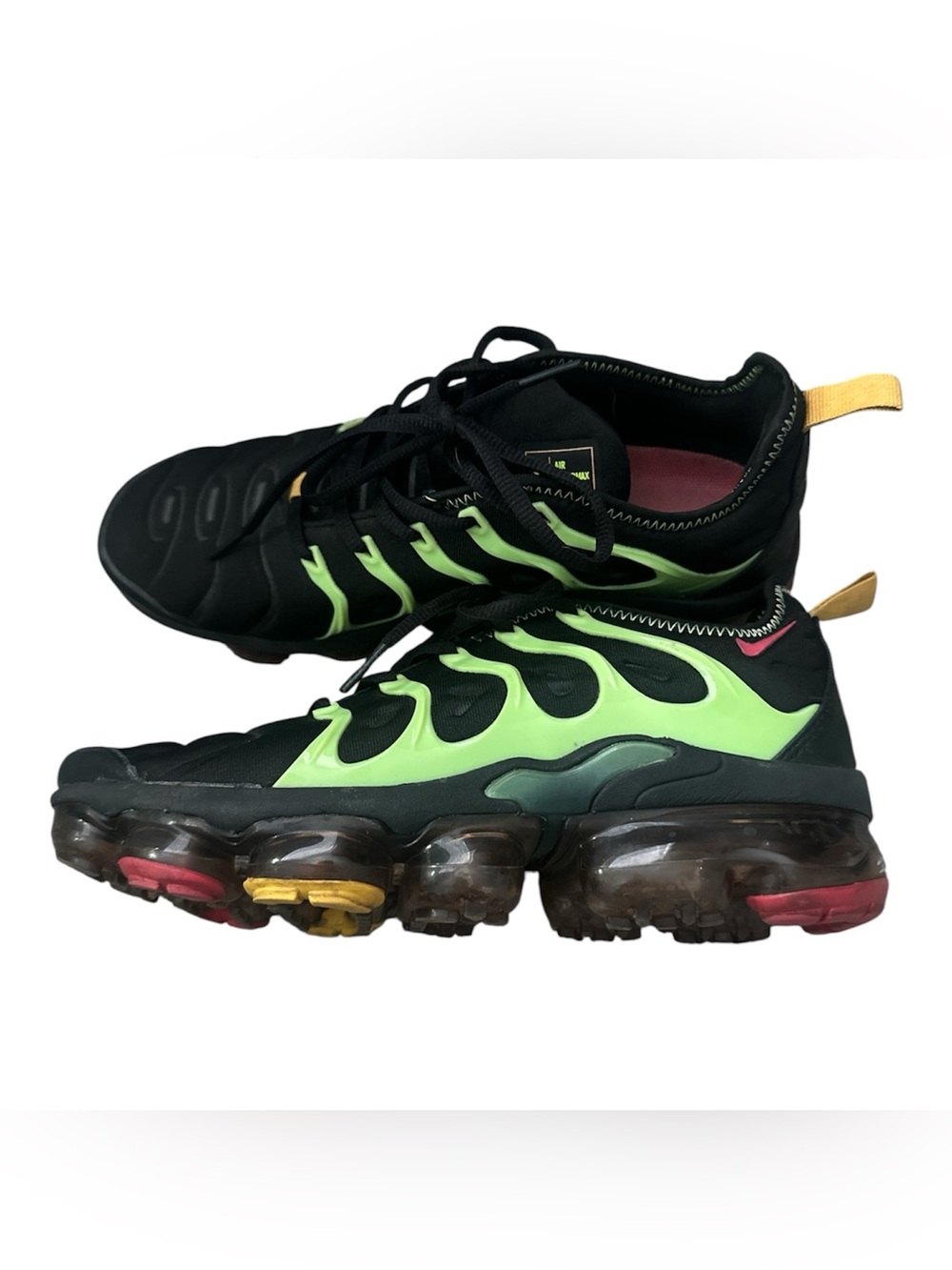 Nike Air VaporMax Plus sneakers in the Black/Electric Green colorway